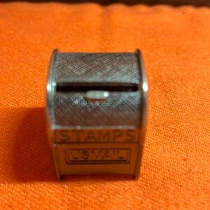 Roll of stamps container. Cute